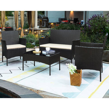 Donn conversation 4 piece rattan sofa seating 2025 group with cushions